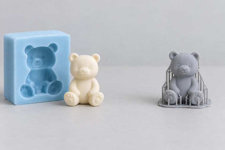 Conceptual cast bear and mold beside a resin printed bear with supports