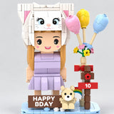 Close-up of the face and outfit on the custom Mini You birthday brick set